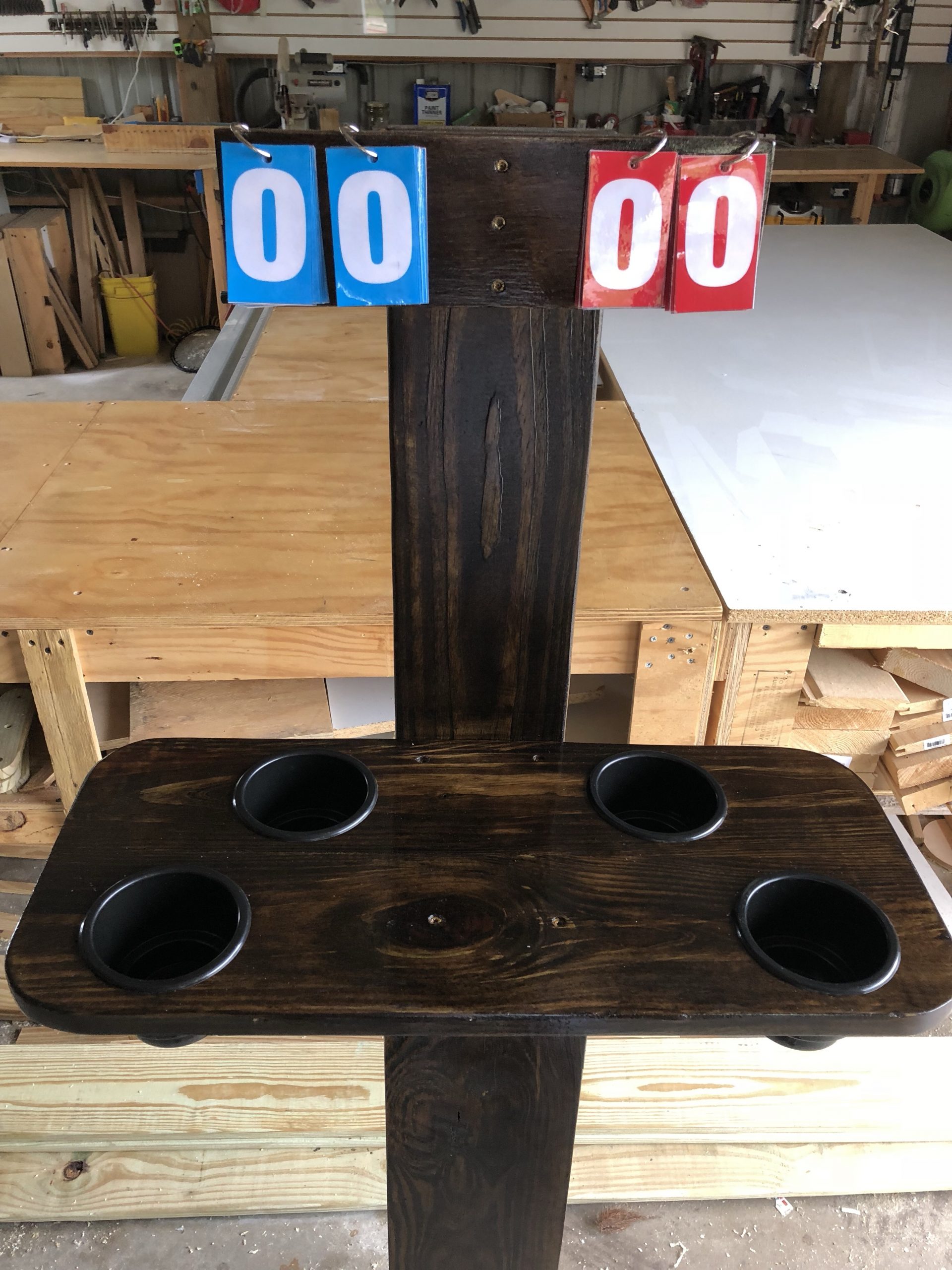 Scoreboard with cup holders